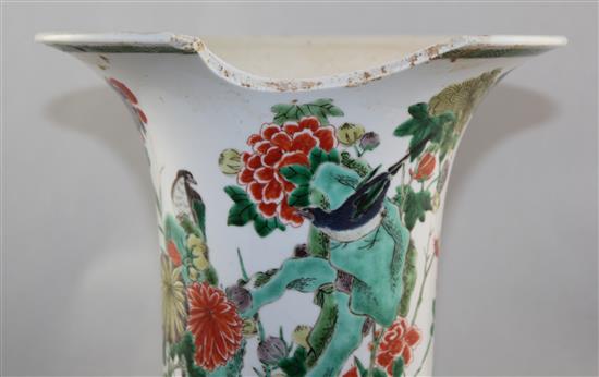 A large Chinese famille verte beaker vase, Gu, Kangxi period, 44.5cm, 11 x 3.5cm section of rim lacking